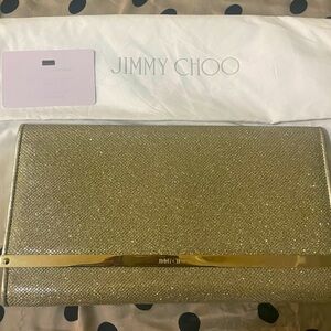 Jimmy Choo shimmery gold clutch. (No chain)